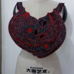 A Red and Black Neck Embroidery