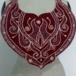Garnet Crest Neck embroidery
